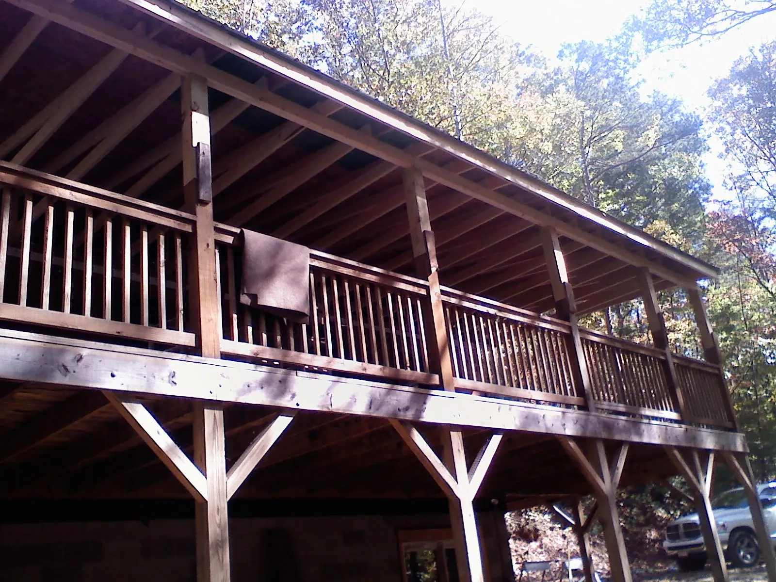 Timber framing under a new elevated porch and deck — Roof Leak Repair in Parmele by Roofing Brothers
